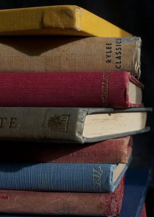 stack of old hardcover books