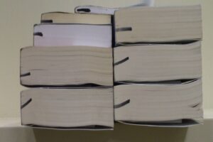 stack of marked remaindered books